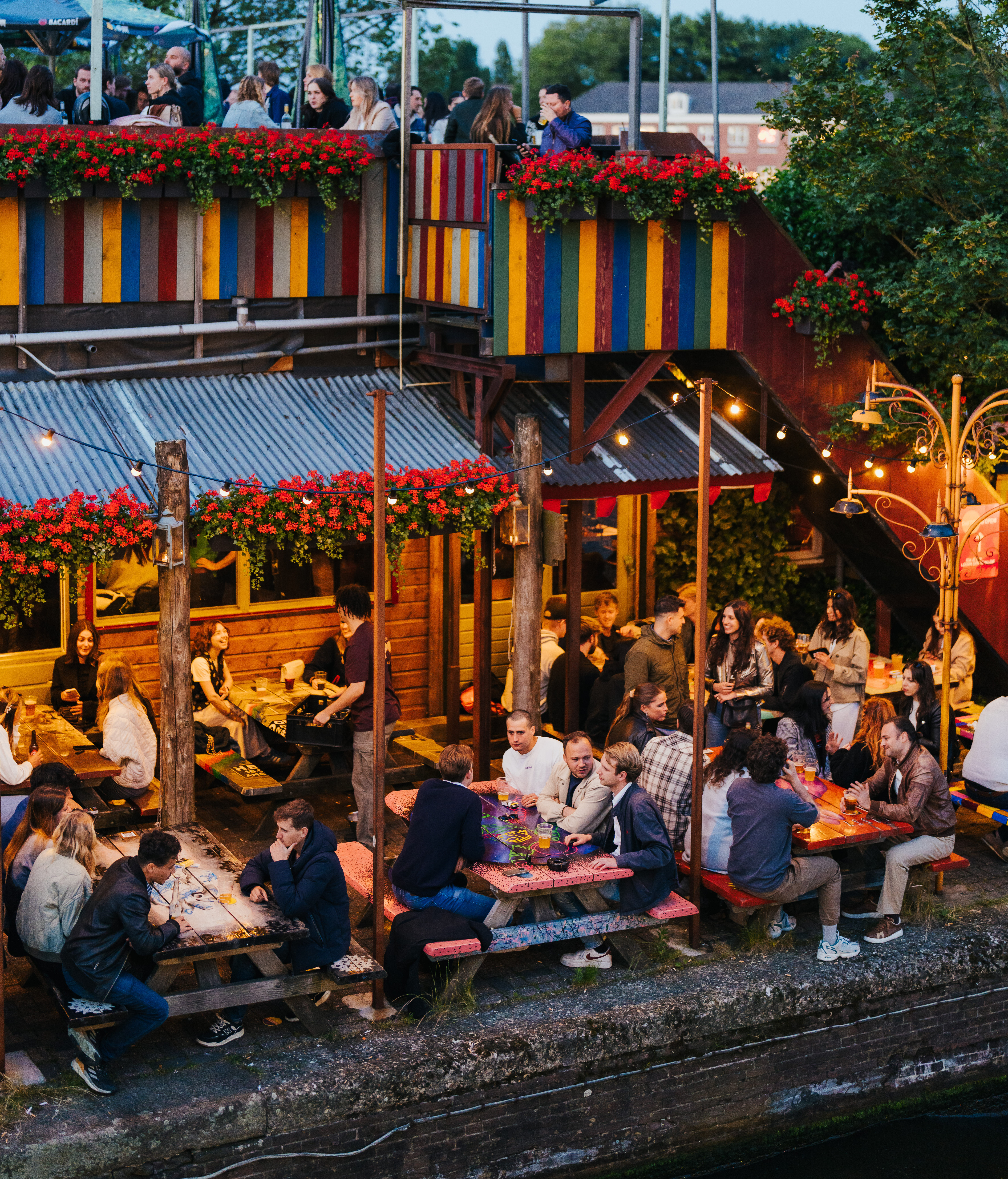 Hannekes Boom's colorful waterside terrace near Oosterdok, Amsterdam